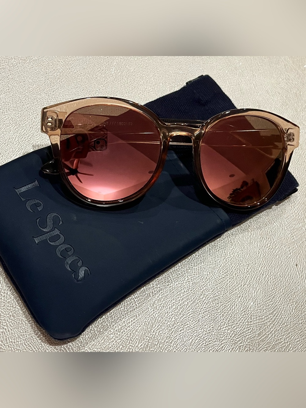 Le Specs Round Sunglasses with Pink Reflective Lenses and Translucent Pink Frame